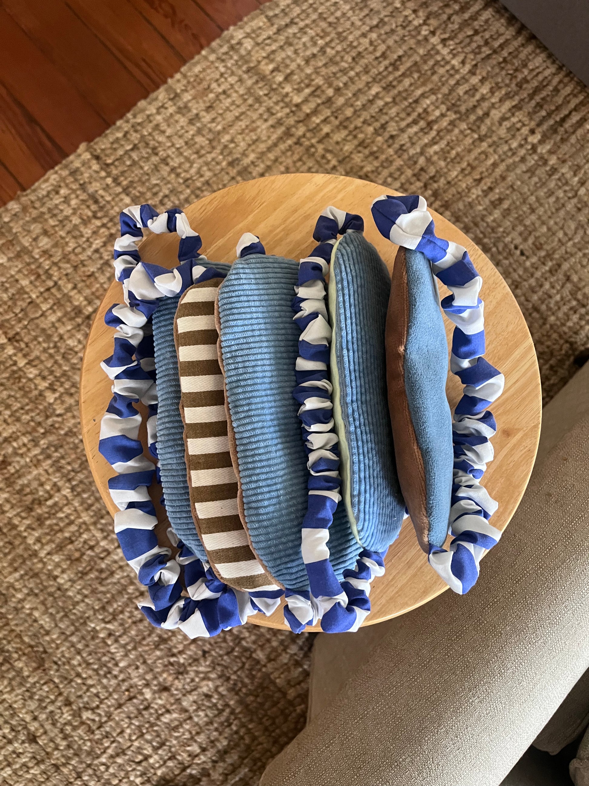 Collection of one of a kind eye masks - blues, browns, and stripes.